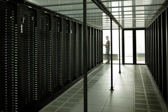 These rows of servers are set up to minimize the energy required to keep the data center running.