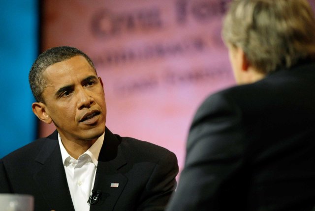 Democratic presidential candidate Sen. Barack Obama talks with Pastor Rick Warren during the Saddleback Forum in Lake Forrest, Calif. on Aug. 16, 2008.