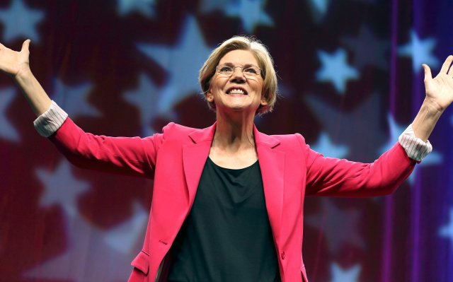 Elizabeth Warren looks to the audience after addressing the Democratic State Convention before the delegate vote in Springfield, Mass. on Saturday, June 2, 2012.