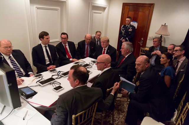 President Donald Trump and Jared Kushner (second, from left) receive a briefing on the Syria military strike from his National Security team, including a video teleconference with Secretary of Defense, Gen. James Mattis, and Chairman of the Joint Chiefs of Staff, Gen. Joseph Dunford, in a secured location at Mar-a-Lago in Palm Beach, Fla on April 6, 2017.