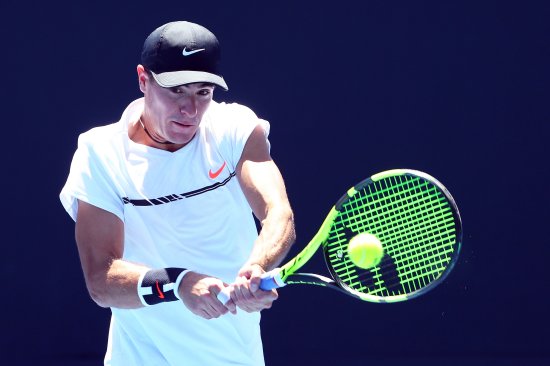 MELBOURNE, AUSTRALIA - JANUARY 19: Ernesto Escobedo of The United States of America plays a backhand in his second round match against David Ferrer of Spain on day four of the 2017 Australian Open at Melbourne Park on January 19, 2017 in Melbourne, Australia. (Photo by Michael Dodge/Getty Images)