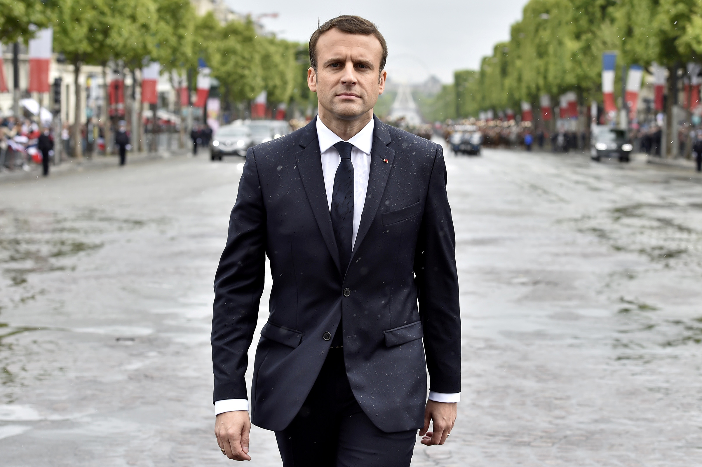 French President Emmanuel Macron arrives to attend a ceremony at the Tomb of the Unknown Soldier at the Arc de Triomphe in Paris