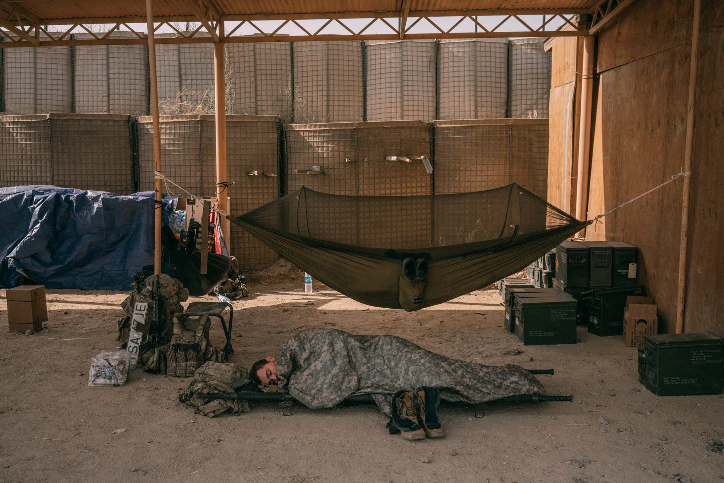 An American soldier sleeps at a military outpost in Ghazni, Afghanistan, in August 2018.