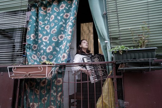 Citizens of Milan take to their balconies on March 13 to serenade their neighbors