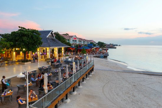 Caribean, Jamaica, Montego Bay, Hotel Sandals Montego Bay, restaurant terrace in the evening