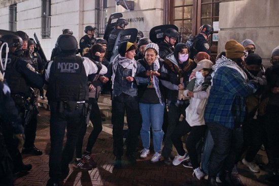 Police remove protestors blocking the entrance to Hamilton Hall, occupied by pro-Palestinian student protestors, on Columbia University campus in New York City, on April 30, 2024.