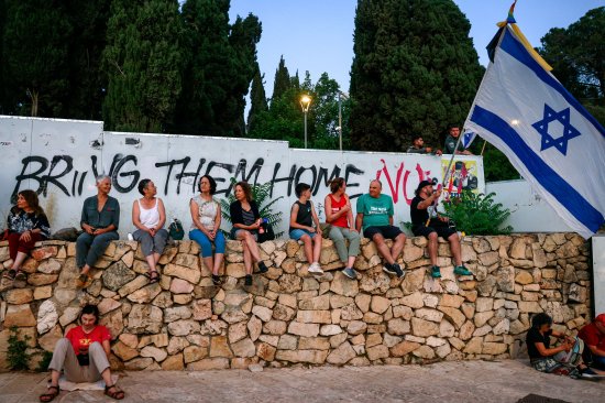 Protesters gather during an anti-government rally calling for early elections, outside the Knesset in Jerusalem, on June 18, 2024.